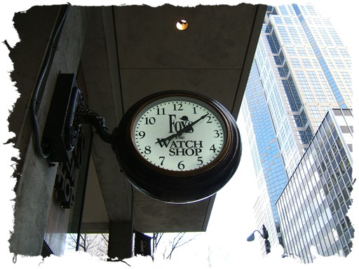 Fox's Gem Shop Sign Clock