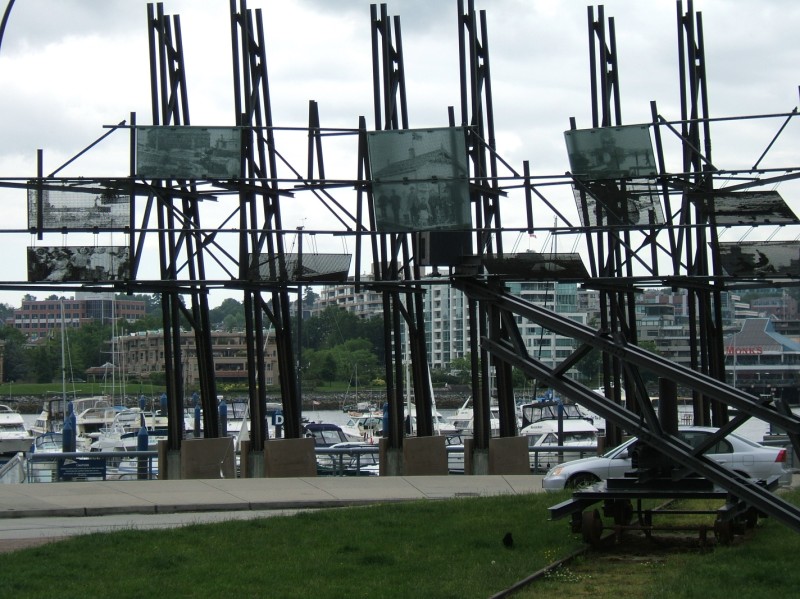 At the roundabout end of Davie Street, steel panels display the 